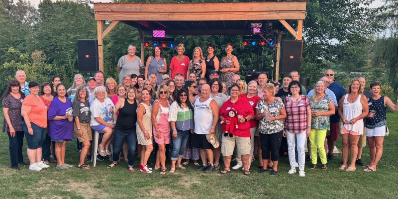 The Class of 1984 posing for a photo at their reunion