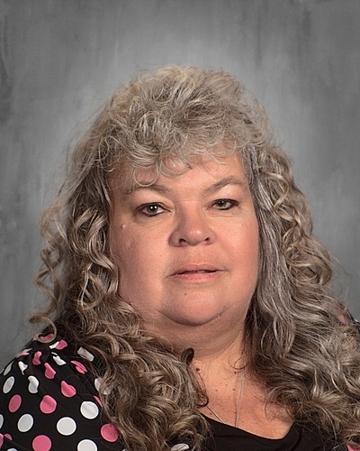 A portrait of Gena Hineline, Assistant to the Superintendent/Student Services Administrative Assistant