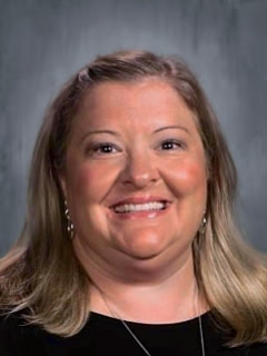 A portrait of Erin Parker, Principal